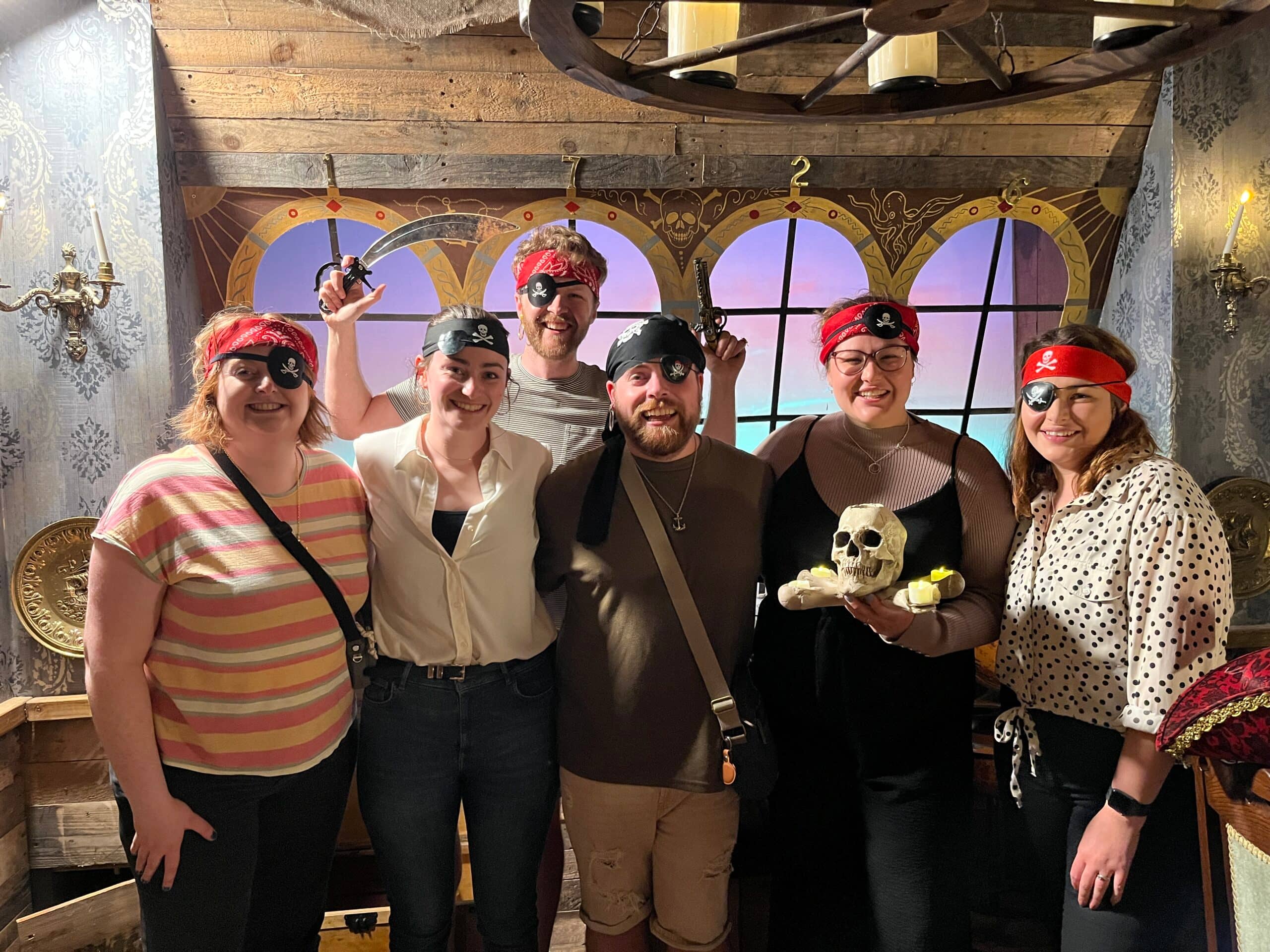A group of friends playing a pirate-themed escape room in Llanfyllin