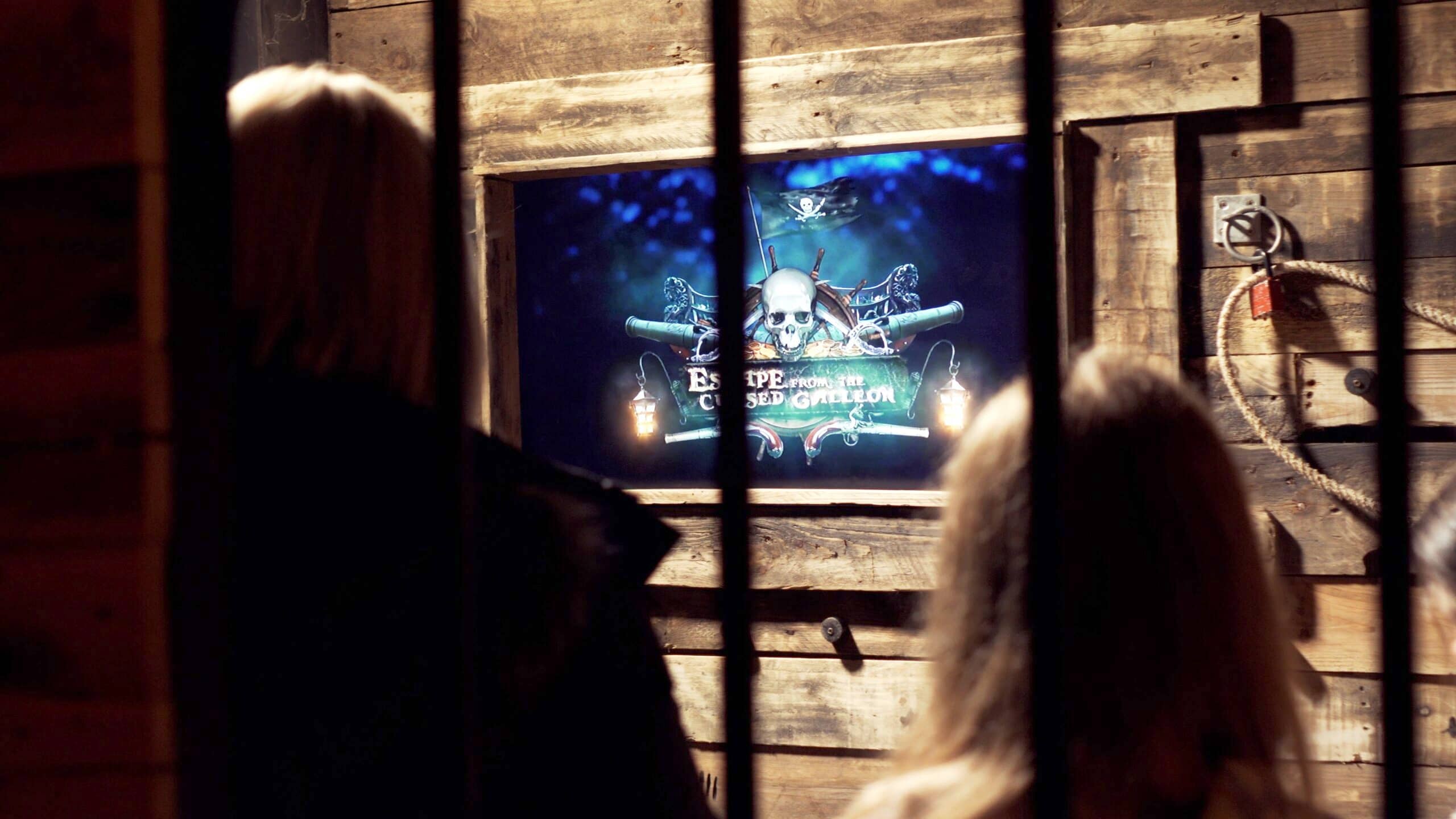 A group of friends playing an escape room game in Oswestry